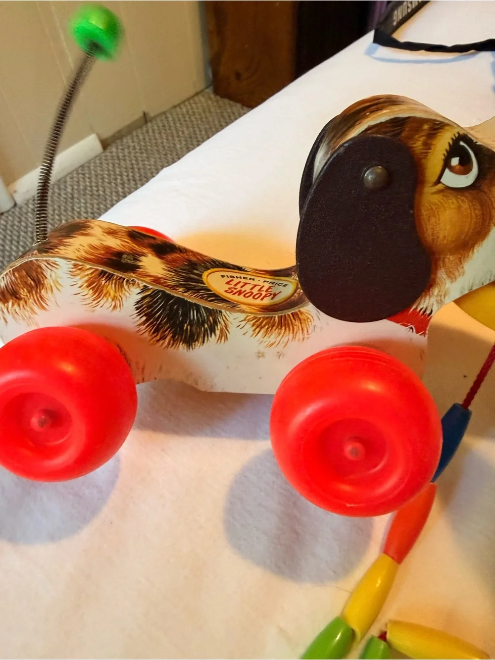 Vintage Wooden Pull-Along Dog Toy in Brown with Red Wheels 1968
